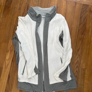 Mixed media cardigan that zips up